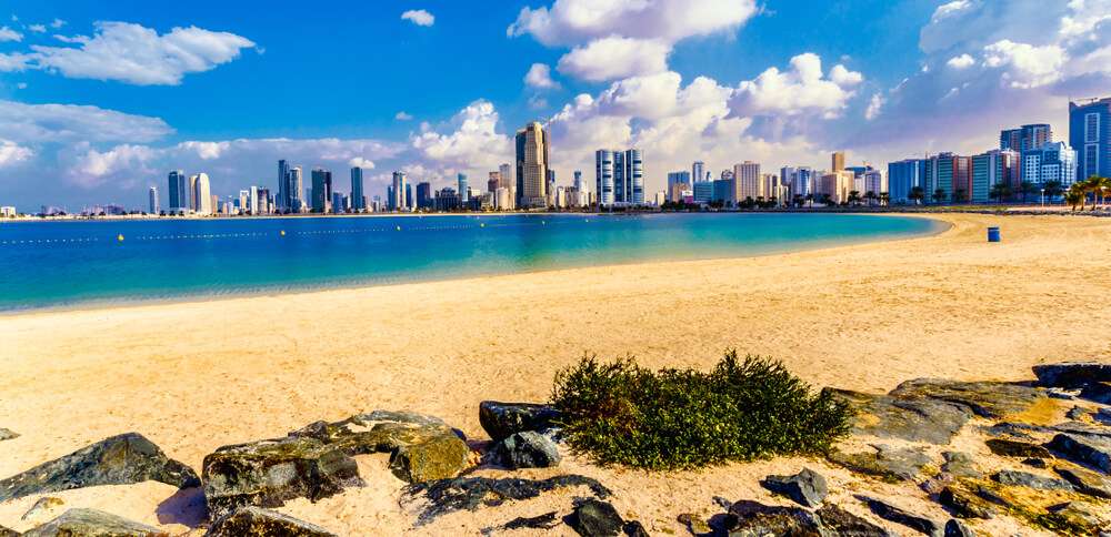 Spend the day at the beach places to visit in sharjah for free