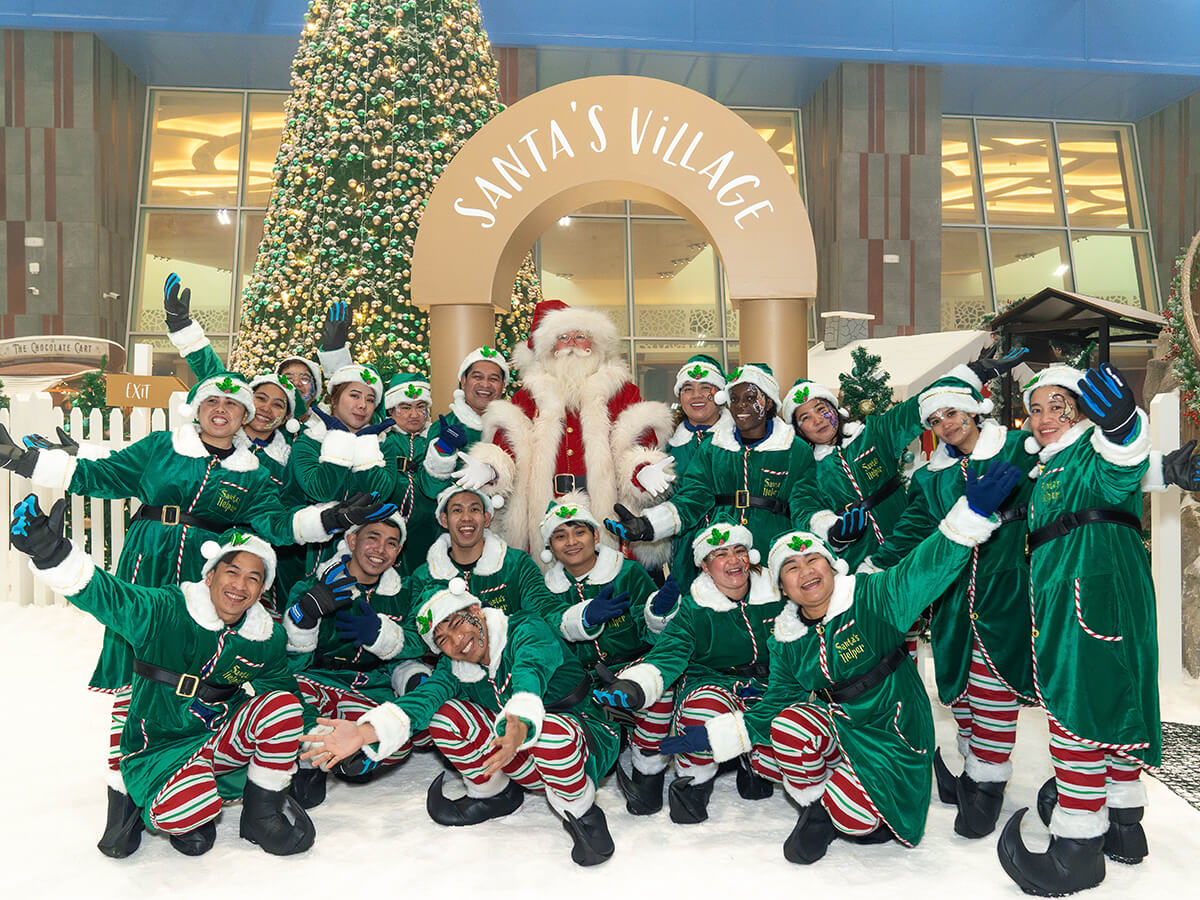 Family Gather with Santa at winter Wonderland snow park in abu dhabi